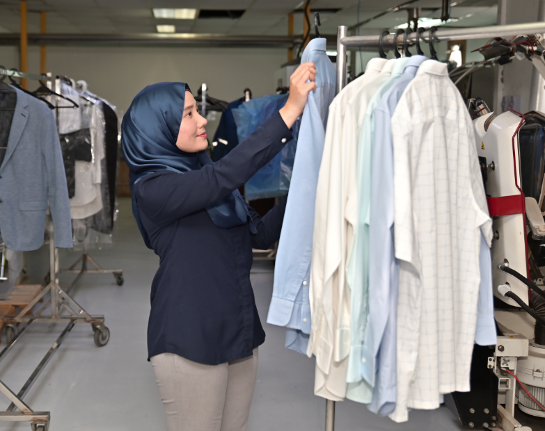 Mas Aero Staff Monitoring Quality of Clothes after Wash Mas Aero Staff Monitoring Quality of Clothes after Wash